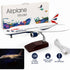 Model airplane with British Airways branding, packaging, and USB cable on a white background