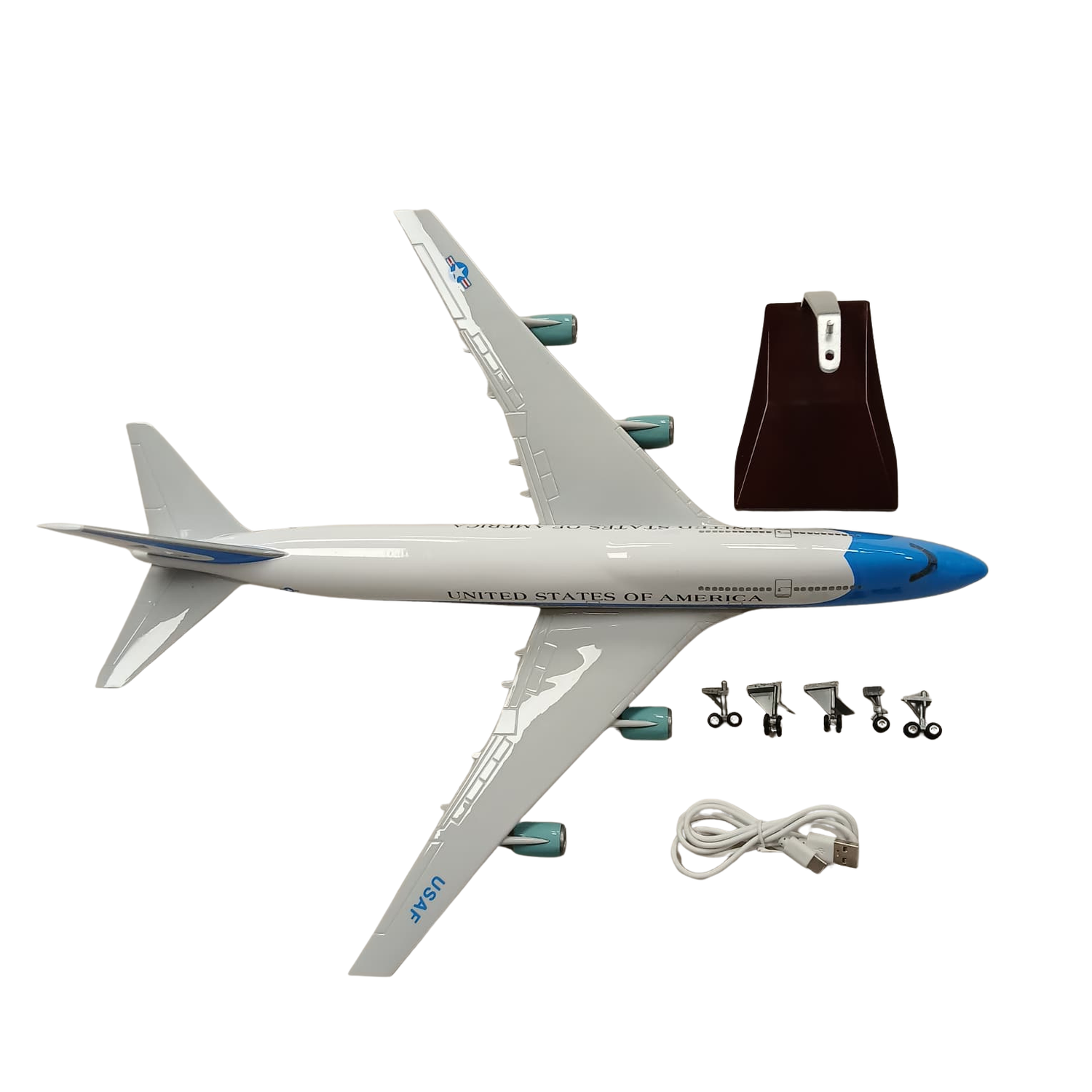 Model airplane with accessories on a white background